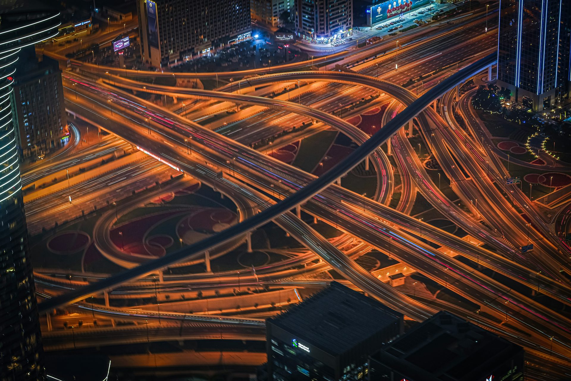 Aerial view of a busy highway interchange at night
